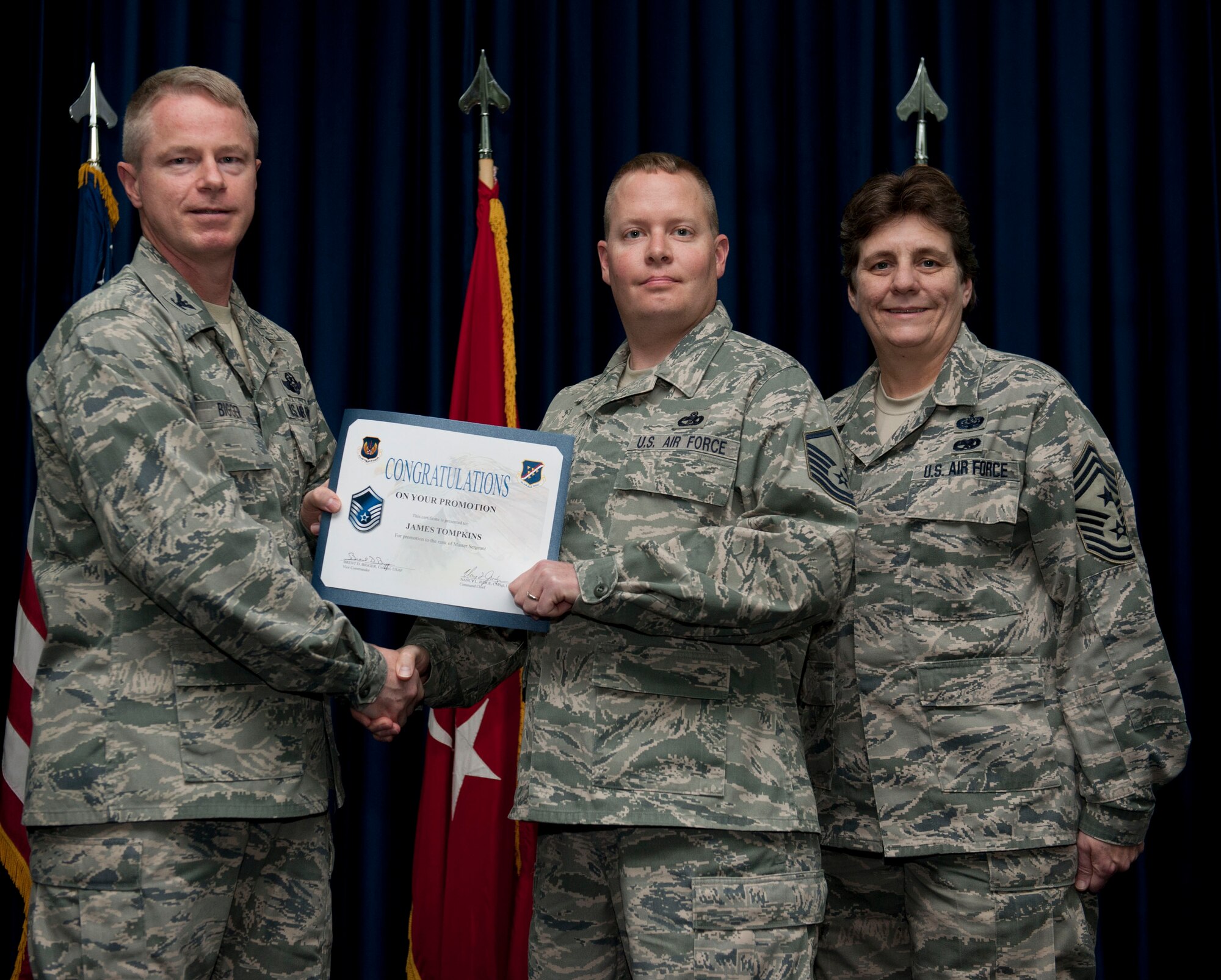 James Tompkins, 728th Air Mobility Squadron, is promoted to the rank of master sergeant Nov. 30, 2012, at the club complex ballroom at Incirlik Air Base, Turkey. (U.S. Air Force photo by Senior Airman Clayton Lenhardt/Released)