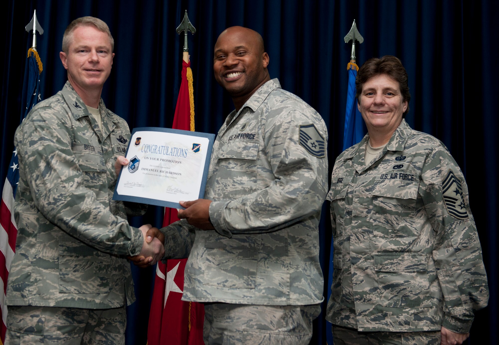 Immanuel Richardson, 39th Medical Support Squadron, is promoted to the rank of master sergeant Nov. 30, 2012, at the club complex ballroom at Incirlik Air Base, Turkey. (U.S. Air Force photo by Senior Airman Clayton Lenhardt/Released)