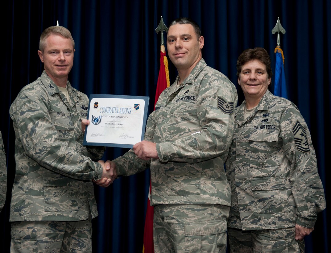Andrew Larson, 39th Logistics Readiness Squadron, is promoted to the rank of technical sergeant Nov. 30, 2012, at the club complex ballroom at Incirlik Air Base, Turkey. (U.S. Air Force photo by Senior Airman Clayton Lenhardt/Released)