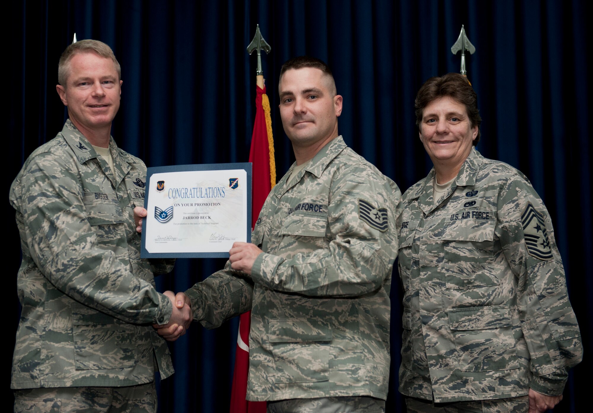 Jarrod Beck, 39th Communications Squadron, is promoted to the rank of technical sergeant Nov. 30, 2012, at the club complex ballroom at Incirlik Air Base, Turkey. (U.S. Air Force photo by Senior Airman Clayton Lenhardt/Released)