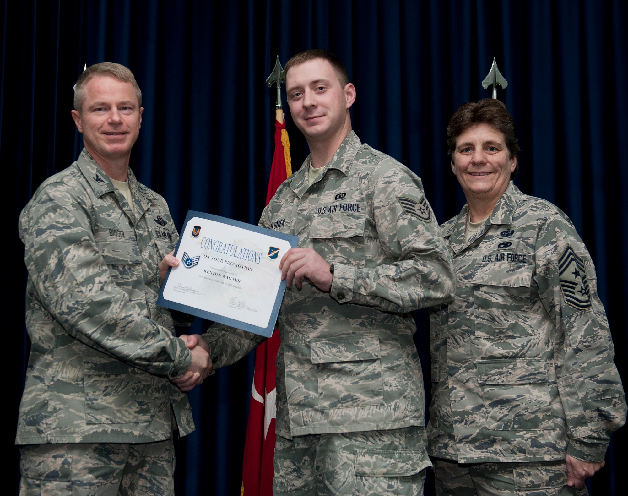 Kenton Wagner, 39th Operations Squadron, is promoted to the rank of staff sergeant Nov. 30, 2012, at the club complex ballroom at Incirlik Air Base, Turkey. (U.S. Air Force photo by Senior Airman Clayton Lenhardt/Released)