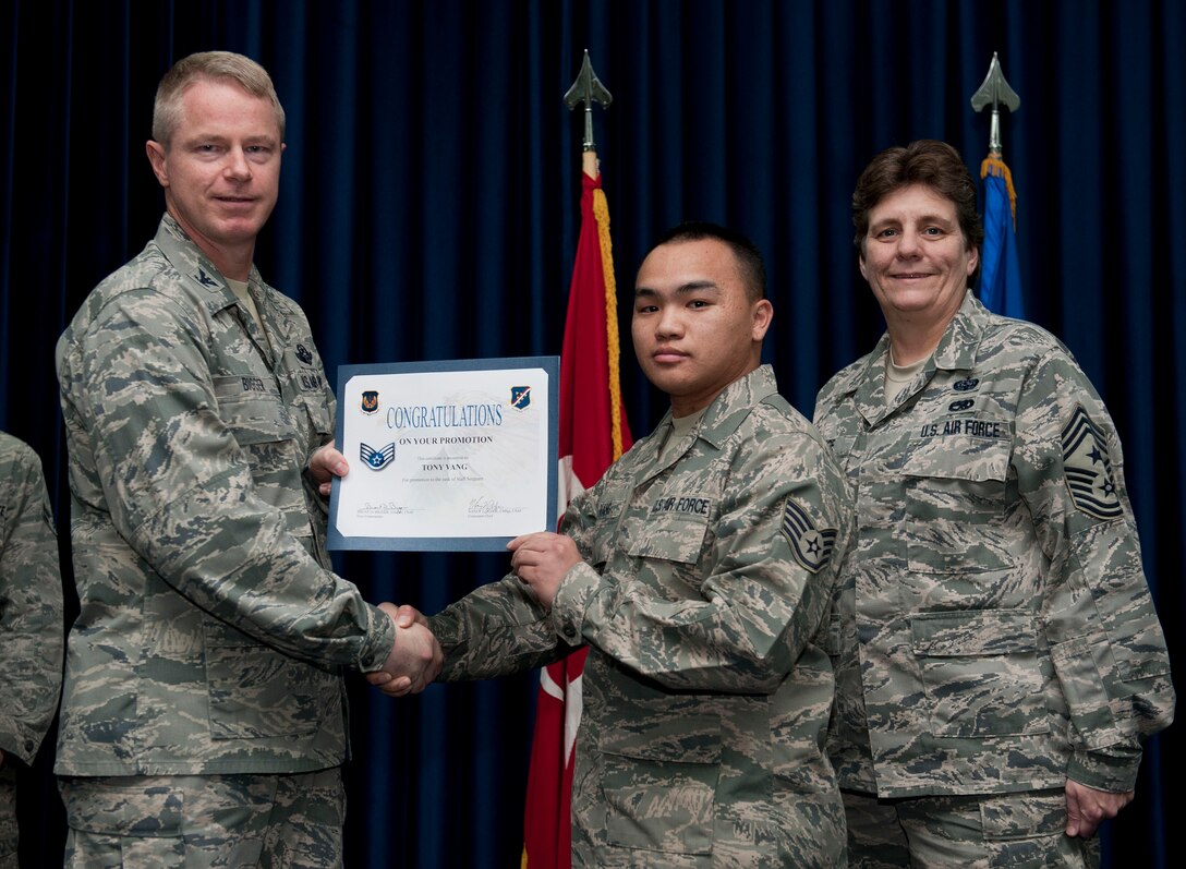 Tony Vang, 39th Communications Squadron, is promoted to the rank of staff sergeant Nov. 30, 2012, at the club complex ballroom at Incirlik Air Base, Turkey. (U.S. Air Force photo by Senior Airman Clayton Lenhardt/Released)
