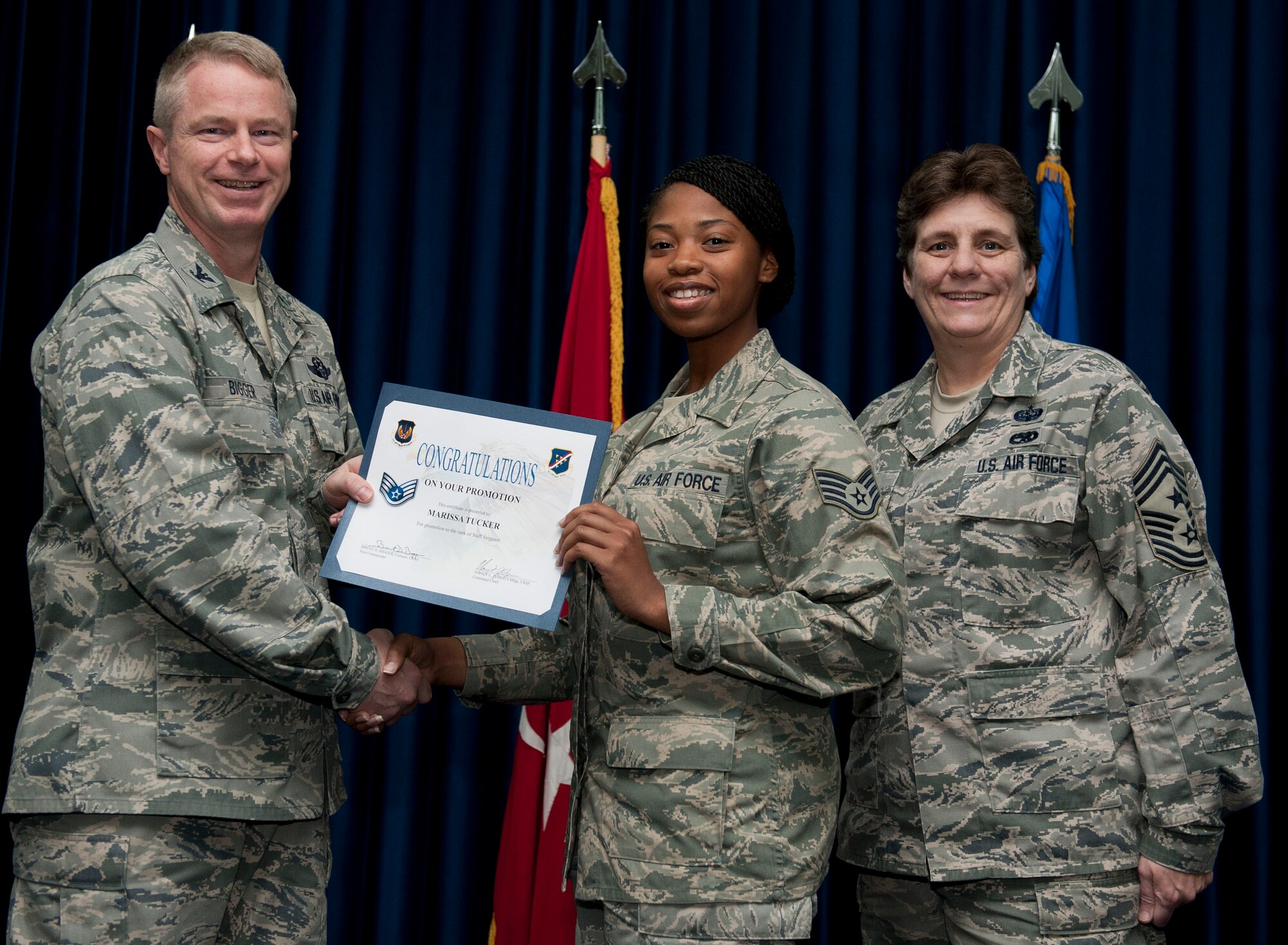 Marissa Tucker, 39th Air Base Wing, is promoted to the rank of staff sergeant Nov. 30, 2012, at the club complex ballroom at Incirlik Air Base, Turkey. (U.S. Air Force photo by Senior Airman Clayton Lenhardt/Released)