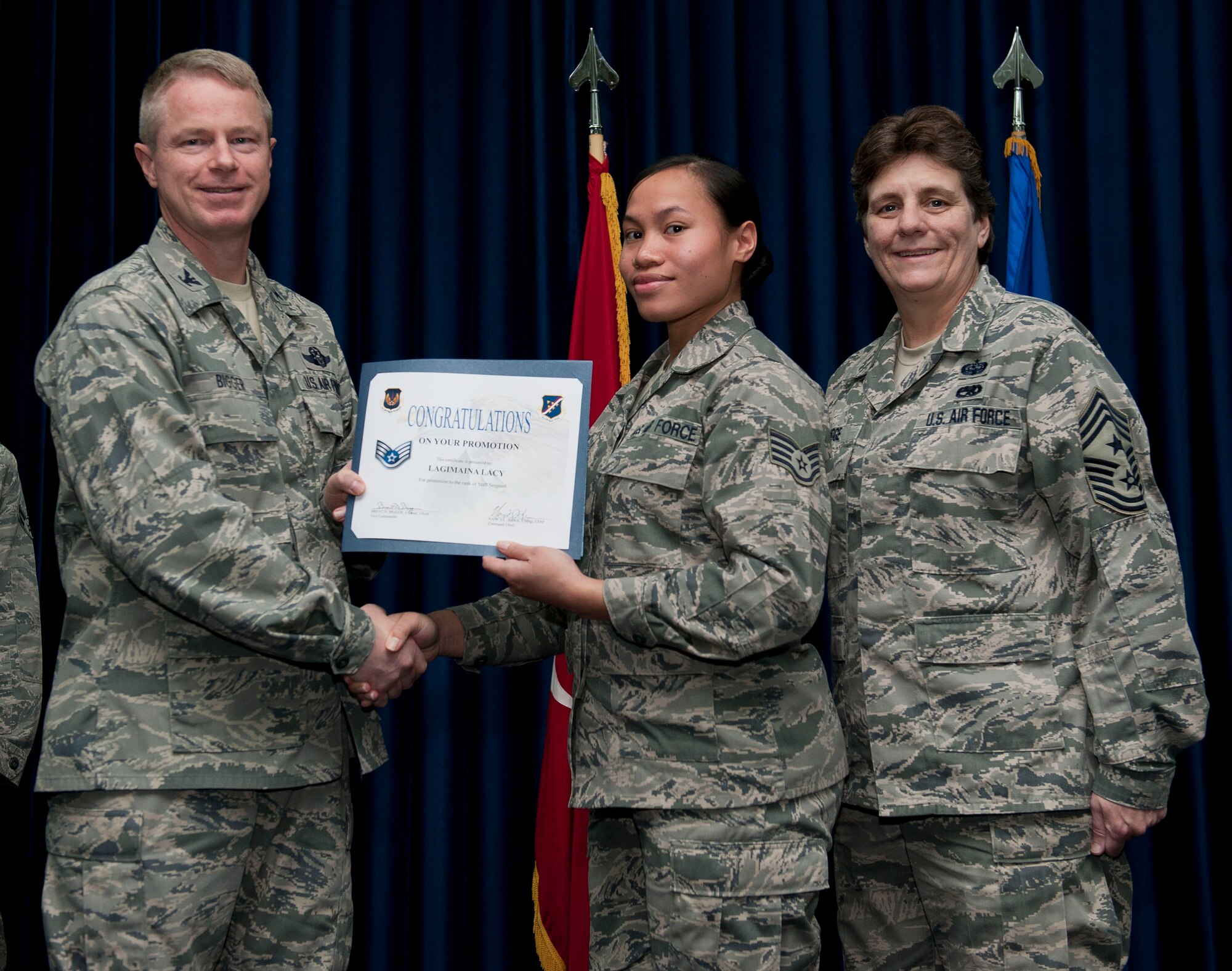 Lagimaina Lacy, 39th Logistics Readiness Squadron, is promoted to the rank of staff sergeant Nov. 30, 2012, at the club complex ballroom at Incirlik Air Base, Turkey. (U.S. Air Force photo by Senior Airman Clayton Lenhardt/Released)
