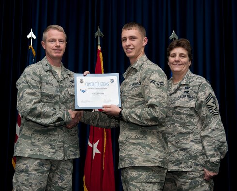 Derek Finster, 39th Medical Operations Squadron, is promoted to the rank of airman first class Nov. 30, 2012, at the club complex ballroom at Incirlik Air Base, Turkey. (U.S. Air Force photo by Senior Airman Clayton Lenhardt/Released)