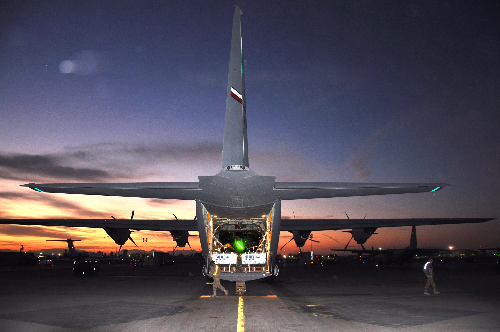 A C-130J with the 772 Expeditionary Airlift Squadron at Kandahar Airfield is loaded with supplies to be airdropped Nov. 15. The aircraft and most of the squadron is deployed from Dyess Air Force Base, Texas. (U.S. Air Force photo/Capt. Tristan Hinderliter) 