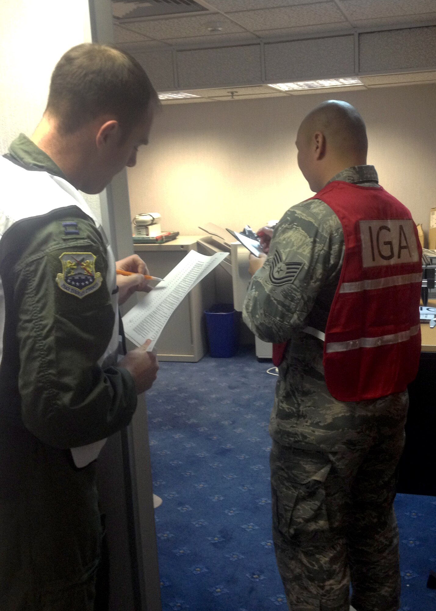 The week of Dec. 3 through 7, inspectors will be assessing peacetime and deployment functions in preparation for a Combined Unit Inspection from USAFE.   
Inspector General Augmenters can be identified by their red or white vests.  
The inspection is scheduled to end Dec. 7, when IGA team members will finalize their observations to provide base leadership with a graded perspective on units’ ability to perform their in-garrison and deployed missions. (Courtesy photo)
