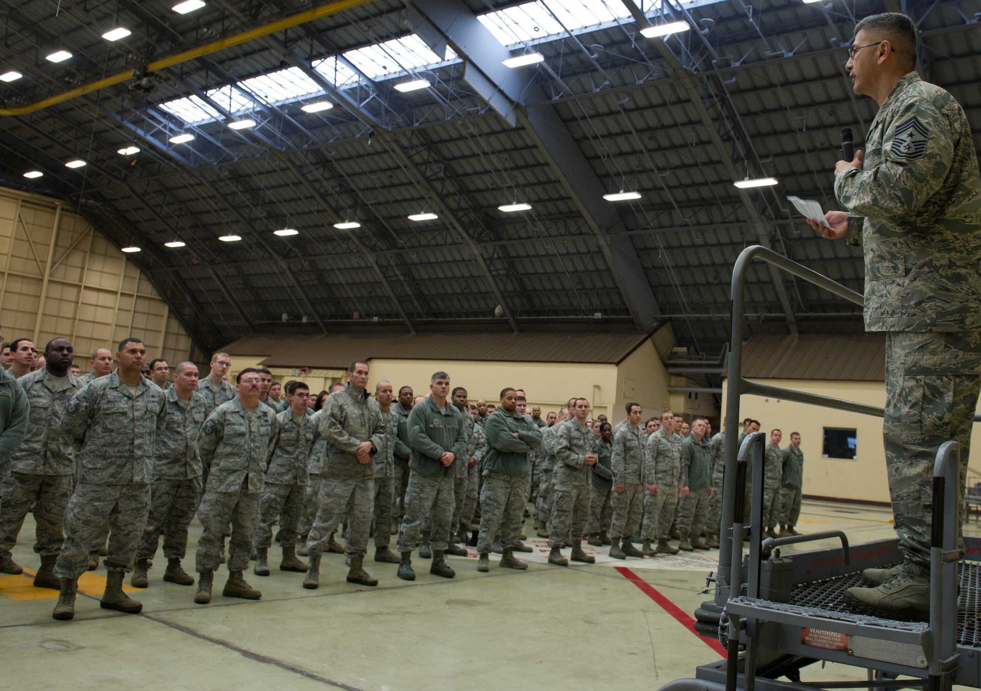 YOKOTA AIR BASE, Japan -- Chief Master Sgt. Manuel Roblesreynoso, 374th Airlift Wing command chief, addresses Yokota enlisted members during an all call held at Yokota Air Base, Japan, Nov. 30, 2012. Base leadership and U.S.F.J. held the all call to reiterate the importance of professionalism and responsibility both on and off base as well as taking care of each other to prevent incidents and poor decisions. (U.S. Air Force photo by Senior Airman Andrea Salazar)