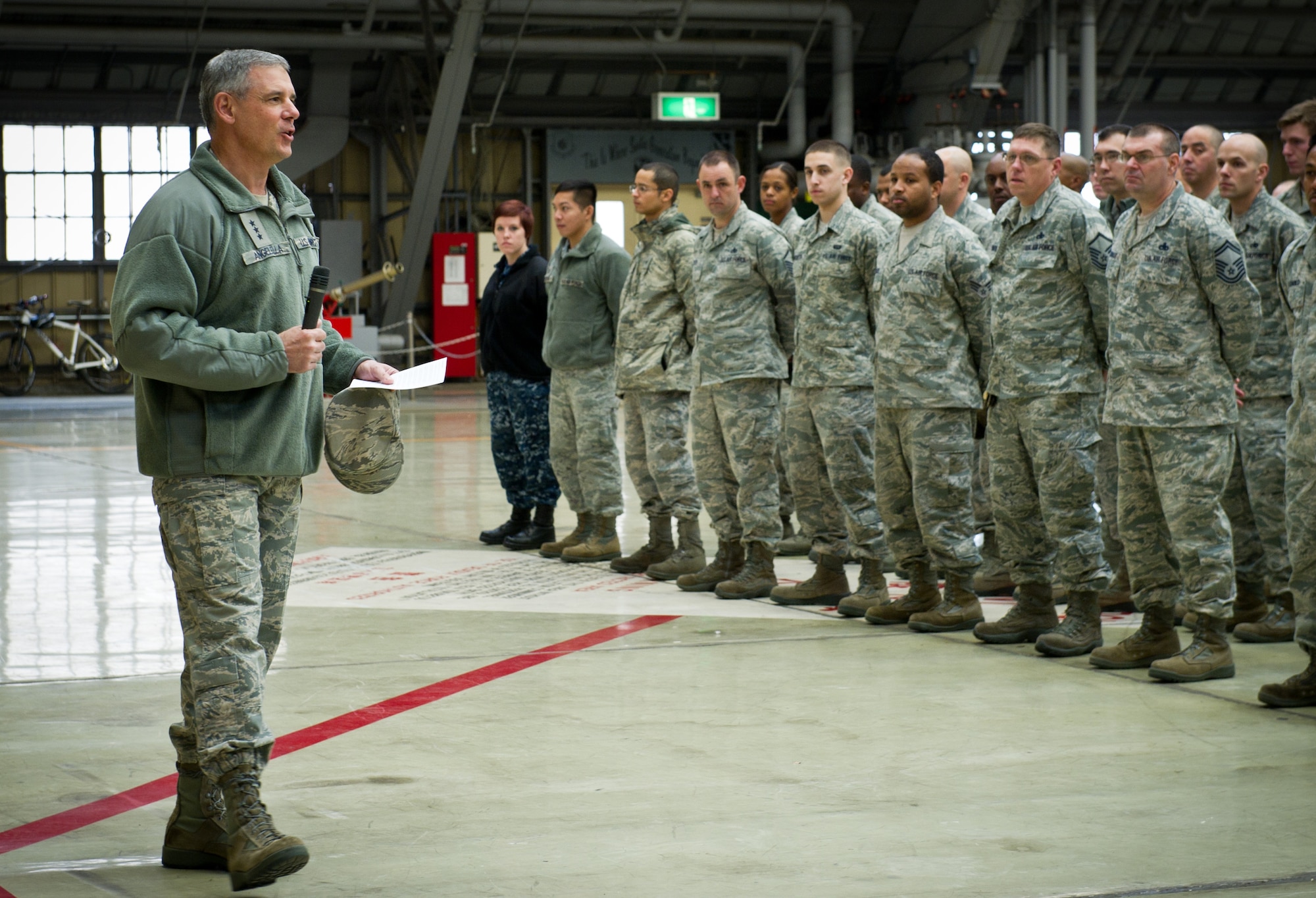 YOKOTA AIR BASE, Japan -- Lt. Gen. Sam Angelella, U.S. Forces Japan, 5th Air Force, commander, speaks to service members during an all call at Yokota Air Base, Japan, Nov. 30, 2012. Base leadership and U.S.F.J. held an all call to reiterate the importance of professionalism and responsibility both on and off base as well as taking care of each other to prevent incidents and poor decisions. (U.S. Air Force photo by Senior Airman Andrea Salazar)