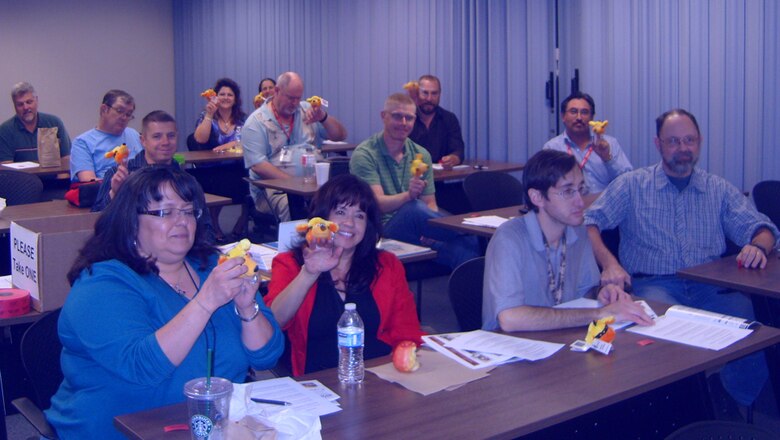 ALBUQUERQUE, N.M., -- DIG meeting participants were given Isotopes mascot finger puppets during a meeting to encourage future involvement.
