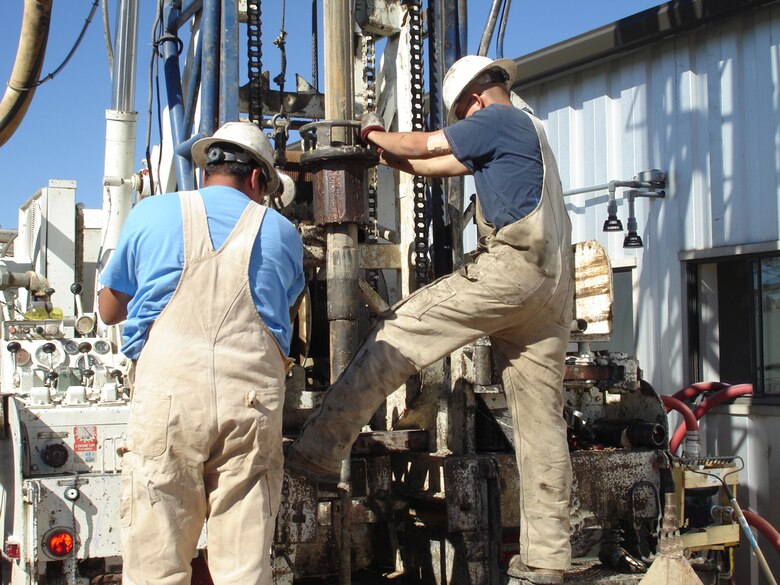 COCHITI LAKE, N.M., -- Working on drilling the new well.