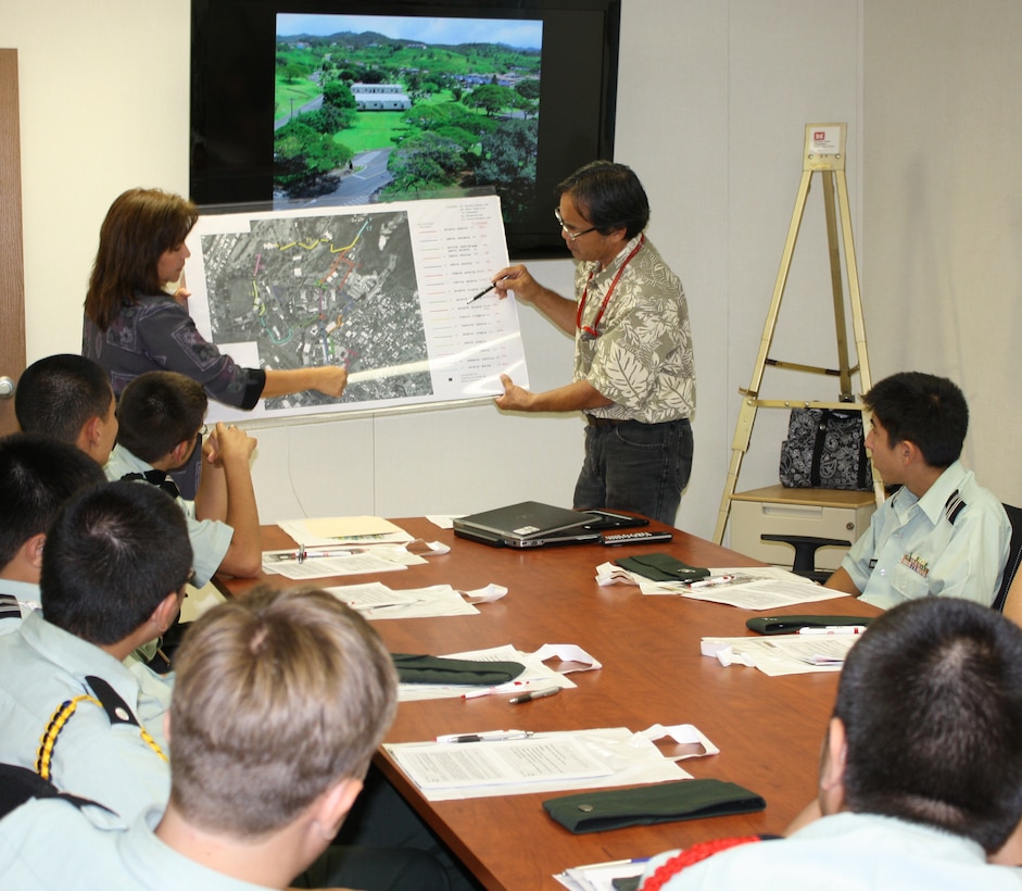 Honolulu District hosted a Professional Development event for 16 Punahou School (Honolulu) Army JROTC cadets and their commander in November inside the project trailer for the Corps’ Command and Control Facility (C2F) project on Fort Shafter. The C2F is the future headquarters for U.S. Army Pacific. The event’s intent was to provide the high-school-age students possible future career opportunities in the Army, specifically in the U.S. Army Corps of Engineers as well as discussing opportunities in the Science, Technology, Engineering, and Mathematics (STEM) fields of study. Cadets listened to a command brief provided by the District Commander and presentations by Honolulu District’s C2F project manager and project engineer about the multi-billion dollar project. Following the briefings cadets asked questions and were able to view the project site from the trailer’s exterior deck.
