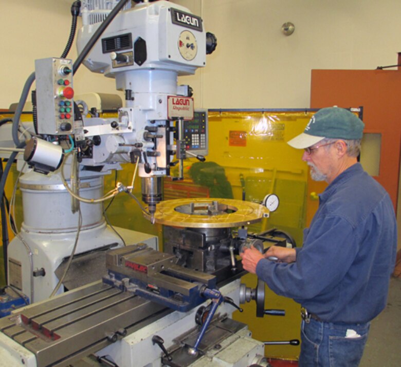 The Dalles powerplant mechanic Terry Best machines a part in preparation for emergency repairs to the navigation lock in December 2012.