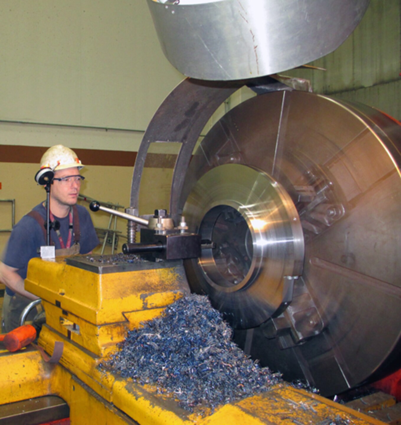 Pete Hobart, The Dalles powerplant machinist,works a part in preparation for emergency repairs to the navigation lock.