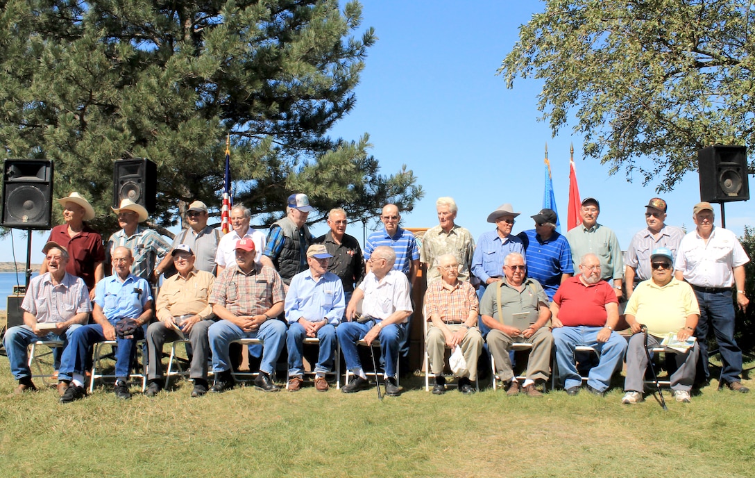 Men who worked during the construction of the Oahe Dam were recognized during and following the ceremony. On Saturday, Aug. 18, the Cultural Heritage Center held reception for them, their spouses and children.
Front Row Left to Right: Milt Oehlerking, Jim Uhrig, George Troppel, Albert Hamert, Verlin Blaseg, Harold Ramse, Willard Heckenlaible, Ken Stewart, Elmer Rossier, Lupe Rodriguez Back Row Left to Right: Fred Baade, Bob Pheil, Albert Schreiber, Frank Fransen, Bill Williams, Gib Hart, Russell Nyhaug, George Biggs, Charles Deverit, Ron McMullen, Dick Howard, Dale Vincent, Arnie Gutenkauf
