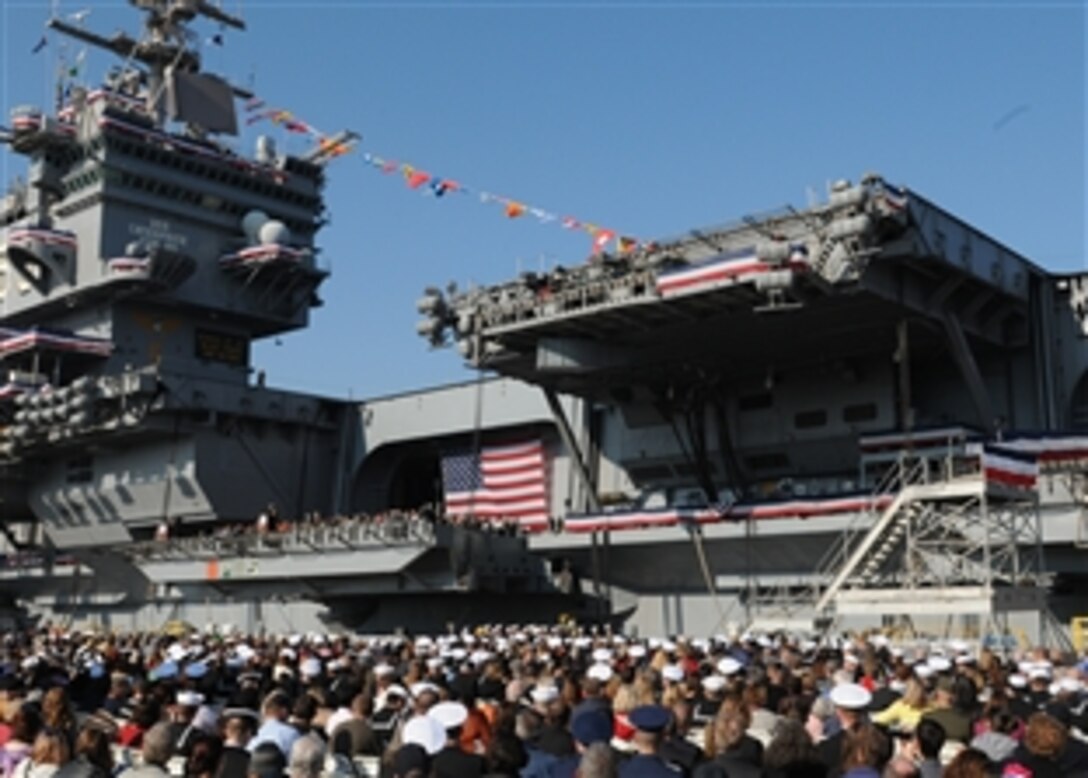 Guests observe the inactivation ceremony of the aircraft carrier USS Enterprise, which was commissioned Nov. 25, 1961 as the first nuclear-powered aircraft carrier. The ceremony marks the end of her 51 years of service.
