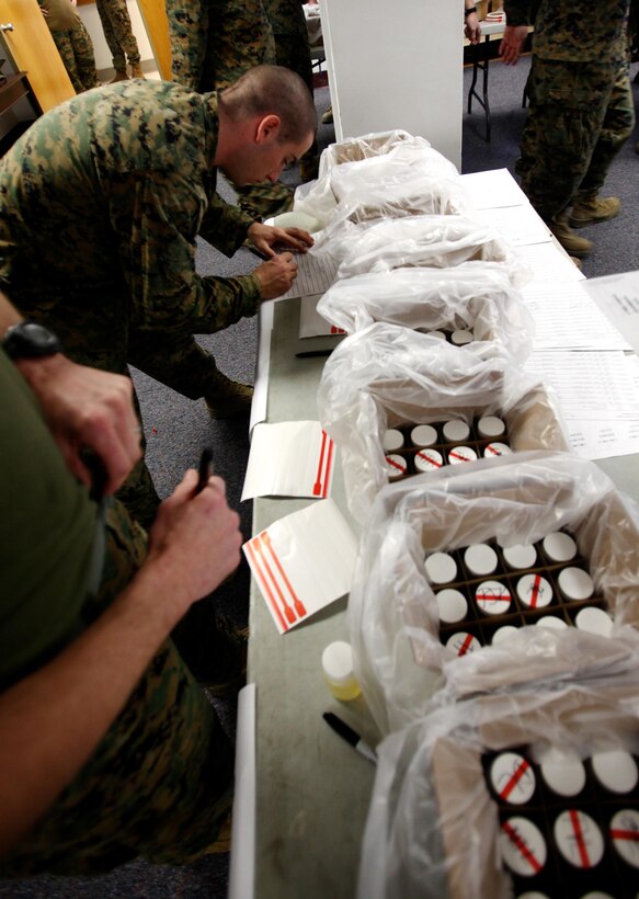 On Nov. 30, Maj. Gen. Ray Fox, commanding general II Marine Expeditionary Force, ordered a MEF-wide urinalysis for the nearly 53,000 active-duty Marines and sailors aboard Marine Corps Base Camp Lejeune. Samples were collected from men and women and shipped for analysis before the end of the day, as a part of the detection phase of the II MEF Counter Drug Campaign to preserve the force and its readiness. (Official Marine Corps photo by Cpl. Daniel A. Wulz)