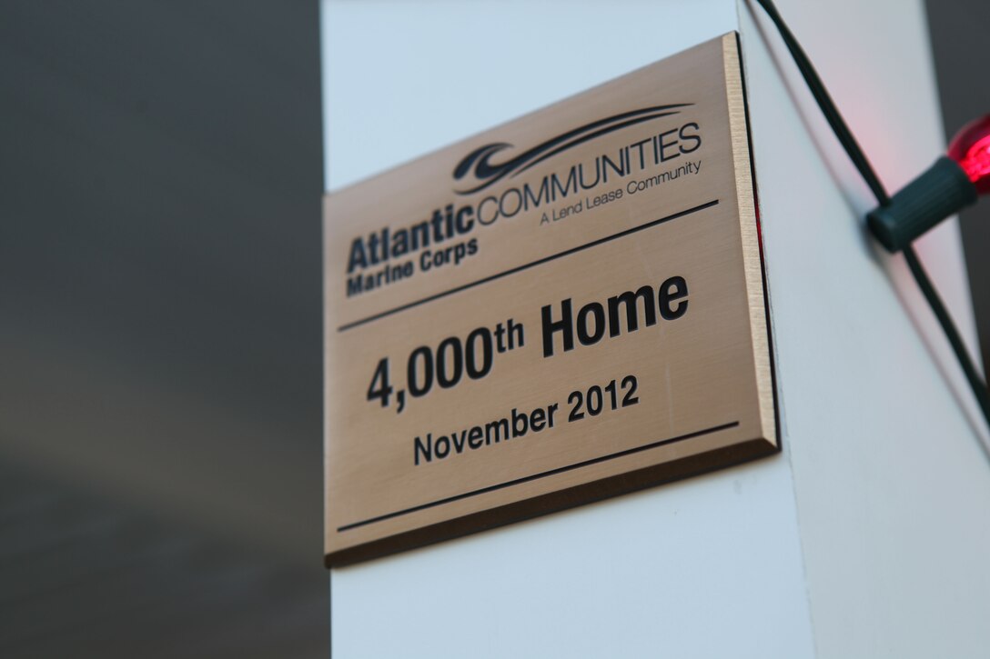 Leaders from Atlantic Marine Corps Communities welcomed new residents to its 4,000th newly built or reconstructed home along with leaders from Marine Corps Base Camp Lejeune and base housing Nov. 29. The new home is in the staff noncommissioned officer enclave in Knox Landing.