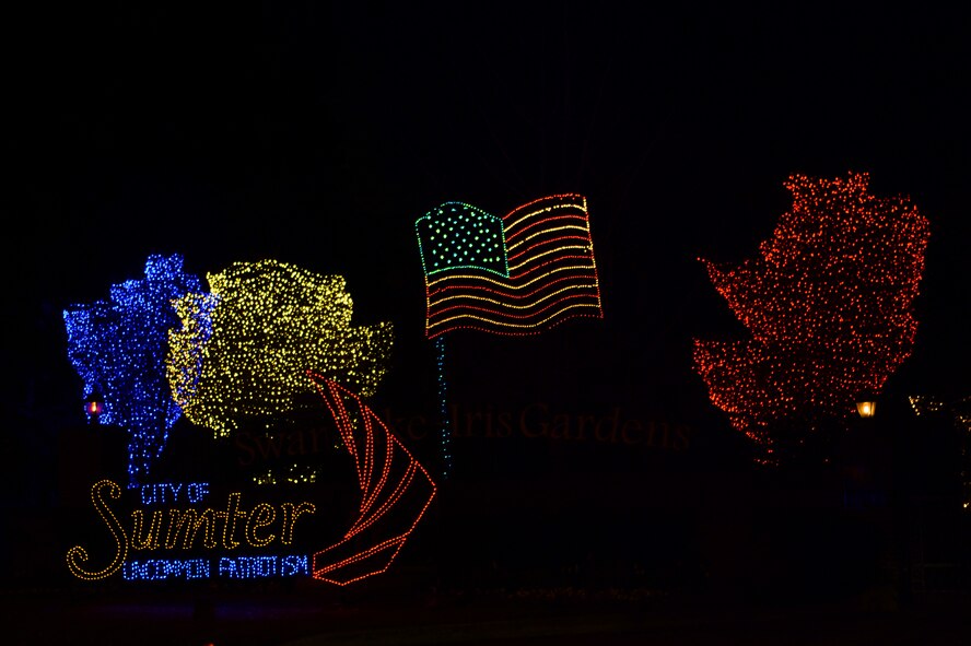 Sumter kicked off the Fantasy of Lights at Swan Lake, S.C. Chirstmas lights were placed all over the lake and many designs adorn the fence surrounding the lake. (U.S. Air Force photo by Airman First Class Krystal M. Jeffers/Released)
