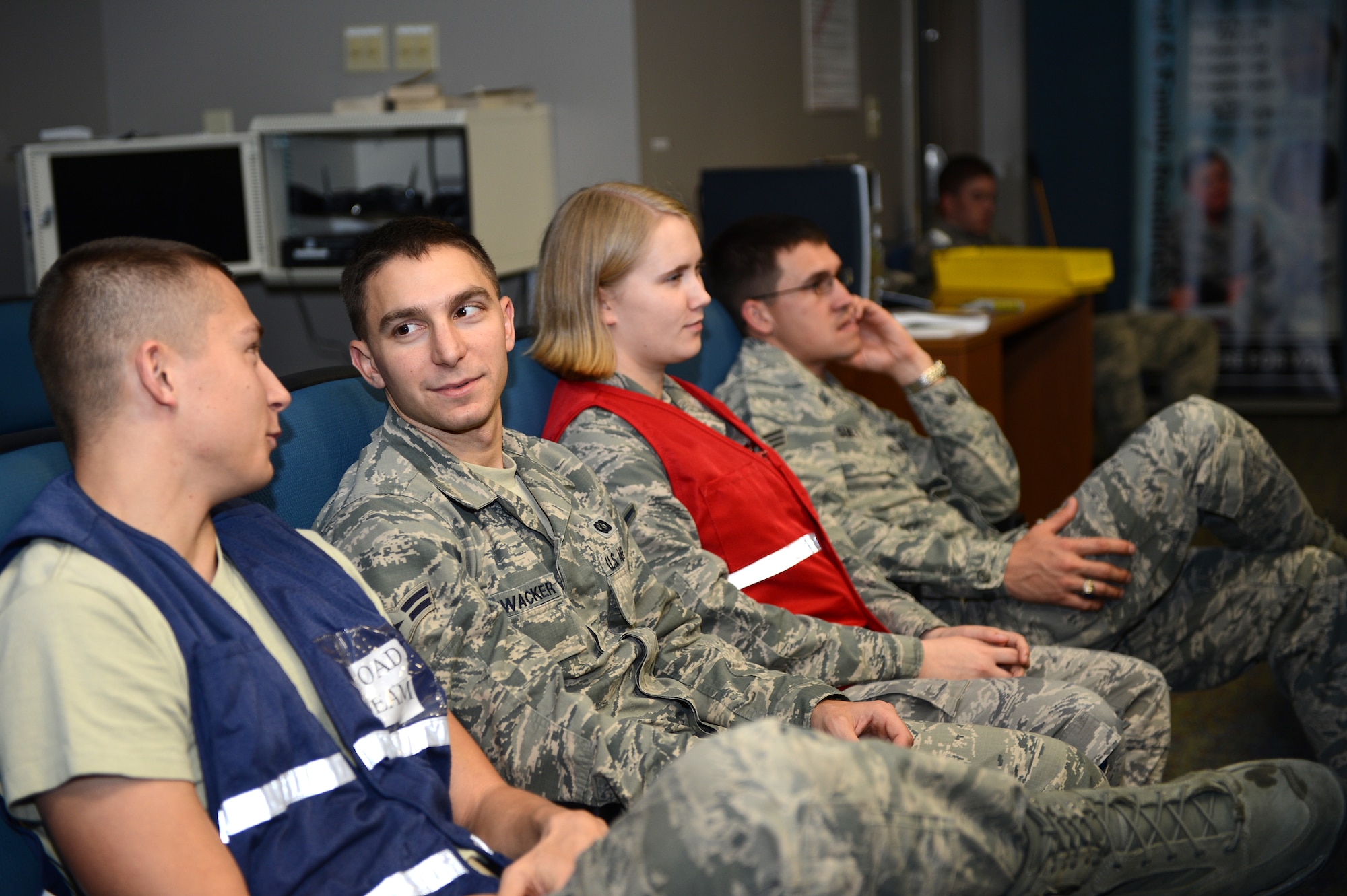 (from left) Airman First Class Felix Kietur, 20th Medical Support Squadron biomedical equipment technician, A1C Saxton Hanwacker, 20th Comptroller Squadron special actions technician, Airman Alyssa Hanson, 20th Force Support Squadron force management journeyman, and Senior Airman Kevin Seney, 20th CPTS special actions technician take a break during a recent Operational Readiness Exercise. Hanwacker is the recipient of the 2012 ACC Financial Management Airman of the Year award. He next competes at the Secretary of the Air Force level. (U.S. Air Force photo by Airman First Class Daniel Blackwell/Released)