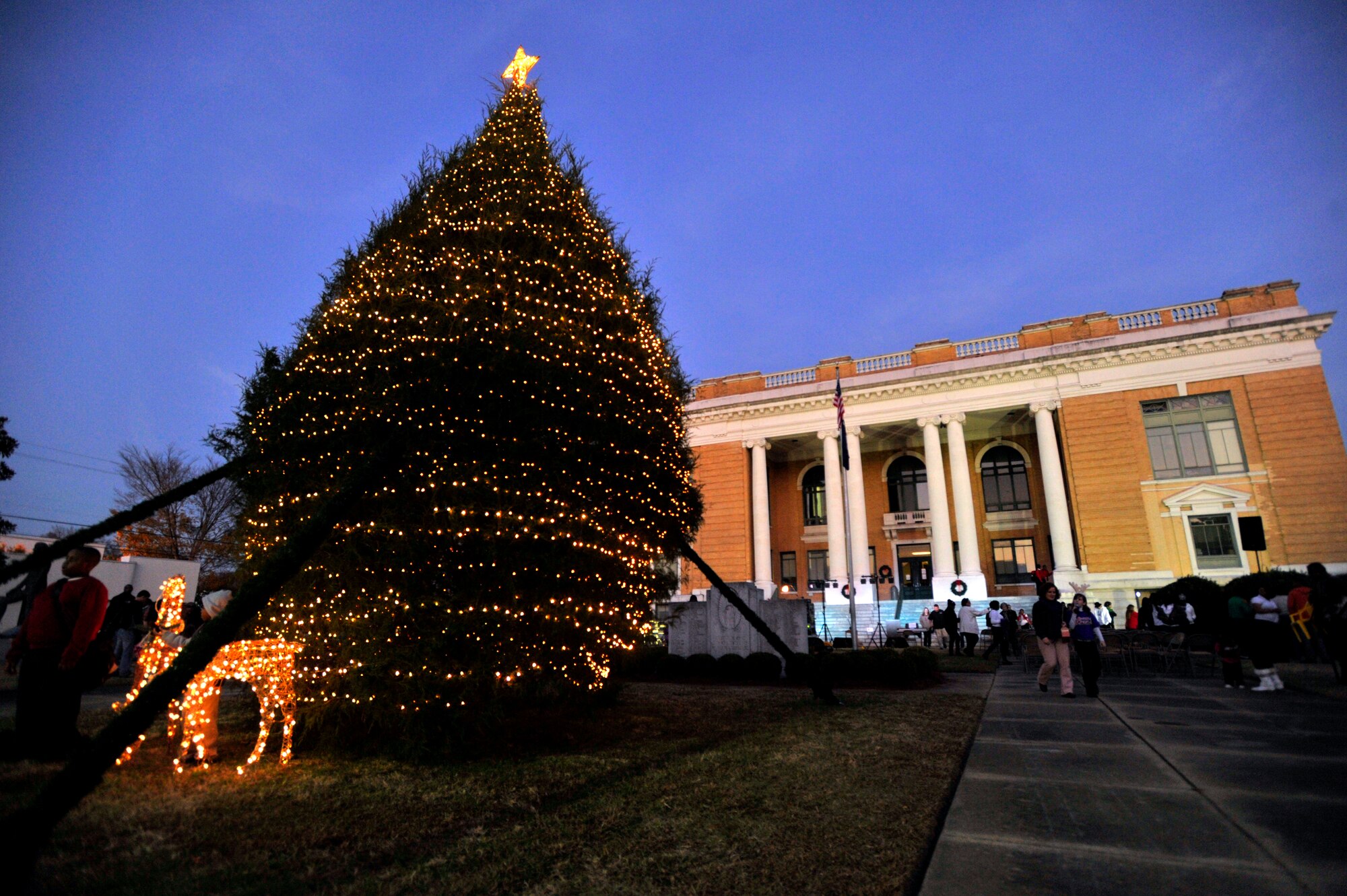 The Sumter Christmas tree illuminates the Sumter County Courthouse after being lit for the first time this year during the Sumter County Council Christmas Tree Lighting Ceremony, Nov. 30, 2012, Sumter S.C. The annual ceremony brought about the holiday spirit as several elementary, junior high, and high school choirs performed Christmas carols for those who gathered at the courthouse to witness the celebration. (U.S. Air Force photo by Staff Sgt. Kenny Holston/Released)
