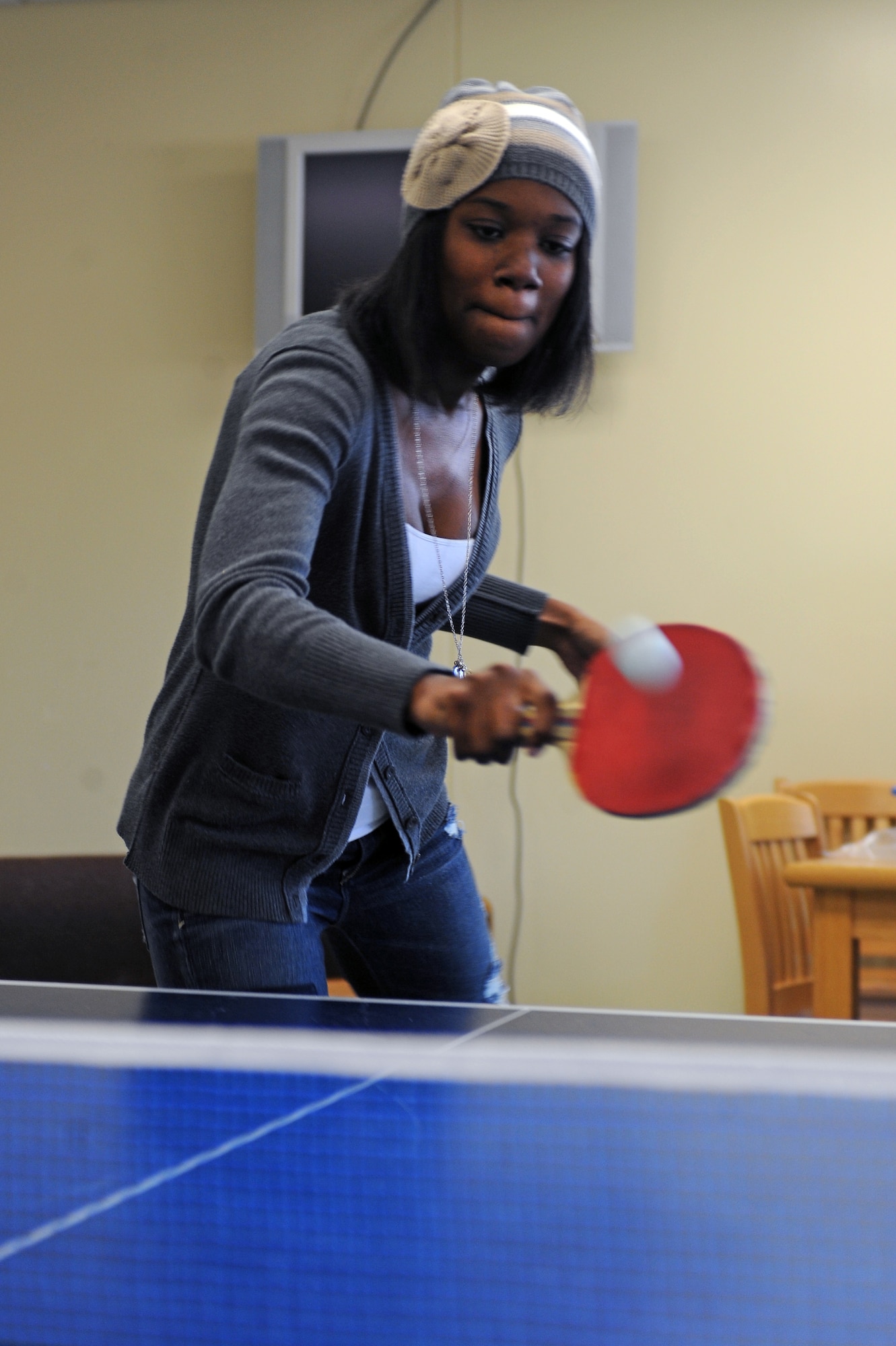 U.S. Air Force Airman 1st Class Adrienne Quinn, 4th Medical Support Squadron health services technician, plays ping pong at the Airman’s Center on Seymour Johnson Air Force Base, N.C., Dec. 1, 2012. The Airman’s Center is open Monday through Friday from 10 a.m. – 6 p.m. (U.S. Air Force photo/Airman 1st Class John Nieves Camacho/Released)