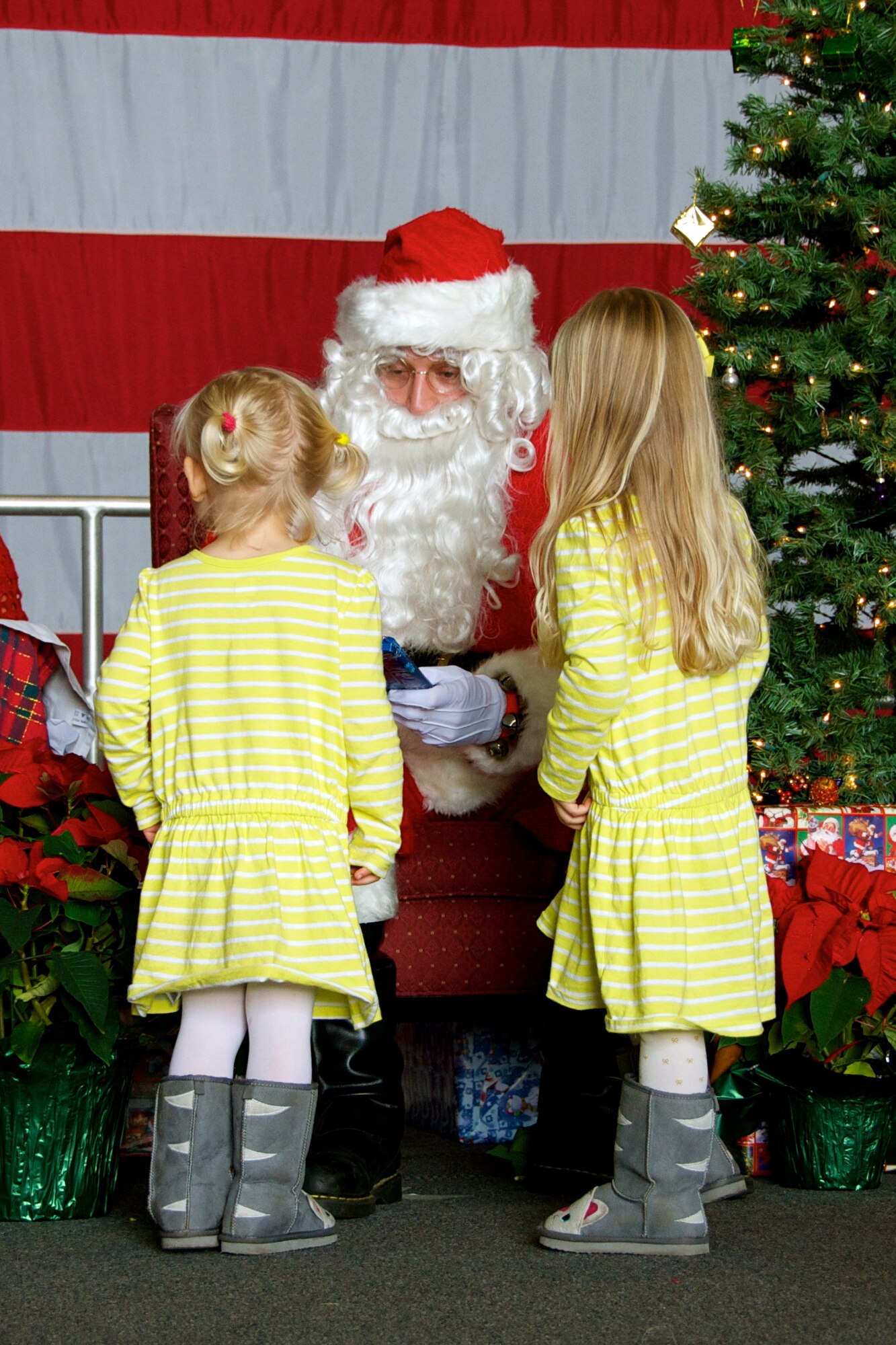 Children met Santa and were given books at the 20th Operations Group Children's Holiday Party, Shaw Air Force Base, S.C. Dec. 1, 2012. (U.S. Air Force photo by Capt. Ann Blodzinski/ Released)