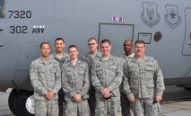 The 'Black Letter' Maintainers: (Front row, left to right) Senior Airmen Dominic Navarro and Jason Rainey, Airman 1st Class Paul Basirico and Tech. Sgt. Sean Jones.  (Back row, left to right) Tech. Sgt. Rodolfo Ramirez, Airman 1st Class Corey Kelty and Tech. Sgt. Tony Shaw.  All are assigned to the 302nd Aircraft Maintenance Squadron. 