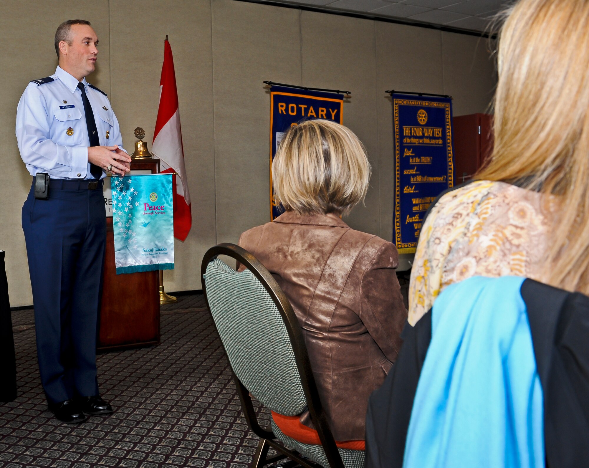 Col. Brian Newberry, 92nd Air Refueling Wing commander, visits with members of the Spokane North Rotary during their weekly meeting at the Red Lion River Inn in Spokane, Wash., Dec. 3, 2012. Newberry is making a point of visiting community service organizations to explain the base’s mission and thank them for their support of Fairchild Airmen and their families. (U.S. Air Force photo by Senior Airman Benjamin Stratton)