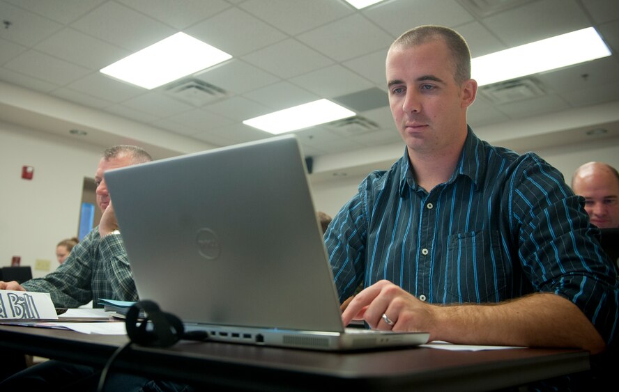 U.S. Air Force Staff Sgt. William Wallace, 23d Maintenance Operations Squadron weapons standardization, works on his resume during a Transition Assistance Program class at Moody Air Force Base, Ga., Nov. 28, 2012. One of the focuses of the new program is converting military training and experience into industry-accepted credentials.  (U.S. Air Force photo by Airman 1st Class Jarrod Grammel/Released)
