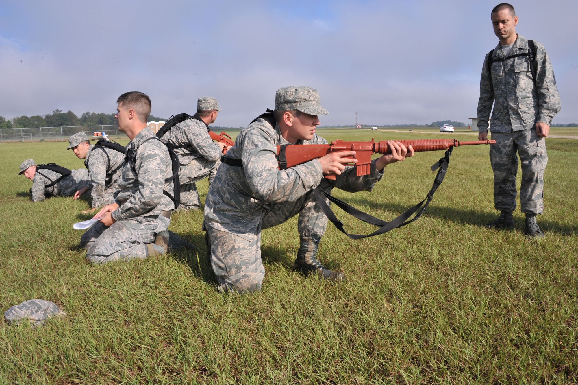 Officer Training School trainees participate in a BELPS exercise during their third week of training at Maxwell Air Force Base, Oct. 3. This exercise required trainees to move as a group without verbally communicating. (U.S. Air Force photo by Airman 1st Class William Blankenship)