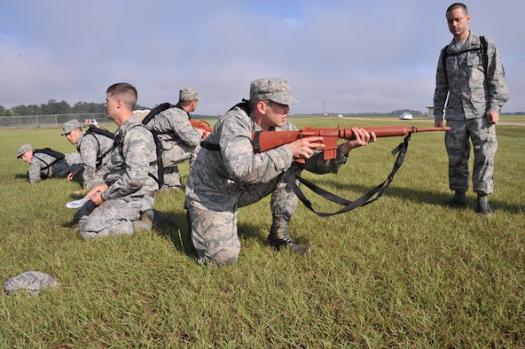 Officer Training School trainees participate in a BELPS exercise during their third week of training at Maxwell Air Force Base, Oct. 3. This exercise required trainees to move as a group without verbally communicating. (U.S. Air Force photo by Airman 1st Class William Blankenship)