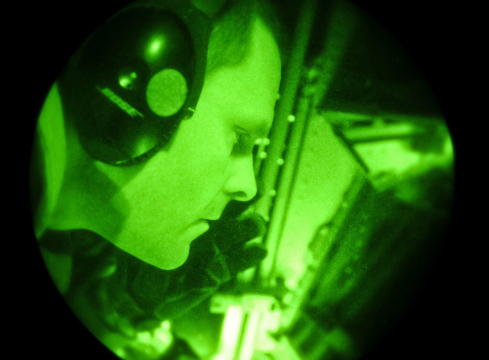 Master Sgt. Ted Buit refuels a C-17 Globemaster III from the 62nd Air Mobility Wing at Joint Base Lewis-McChord, Wash., from the boom pod of a 92nd Air Refueling Squadron KC-135 Stratotanker over Washington and Oregon, Nov. 15, 2012. Buit is the 92nd Operations Group standards evaluations NCO in charge and career boom operator. On this flight he surpassed 7,500 mishap free flying hours. (U.S. Air Force photo by Senior Airman Benjamin Stratton)