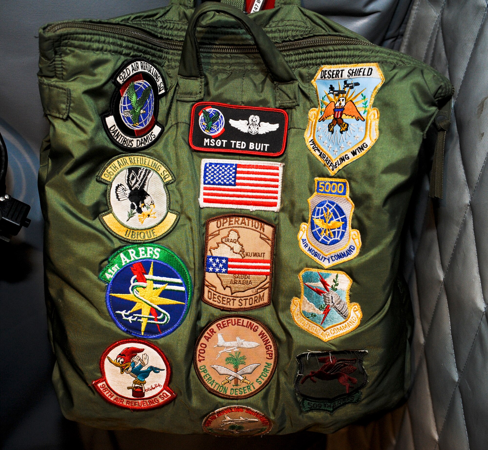 Master Sgt. Ted Buit’s flight bag reveals many of the patches he has warn in his more than 23-year career at Fairchild Air Force Base, Wash., Nov. 15, 2012. Buit is the 92nd Operations Group standards evaluations NCO in charge and career boom operator. On this flight he surpassed 7,500 mishap free flying hours. (U.S. Air Force photo by Senior Airman Benjamin Stratton)