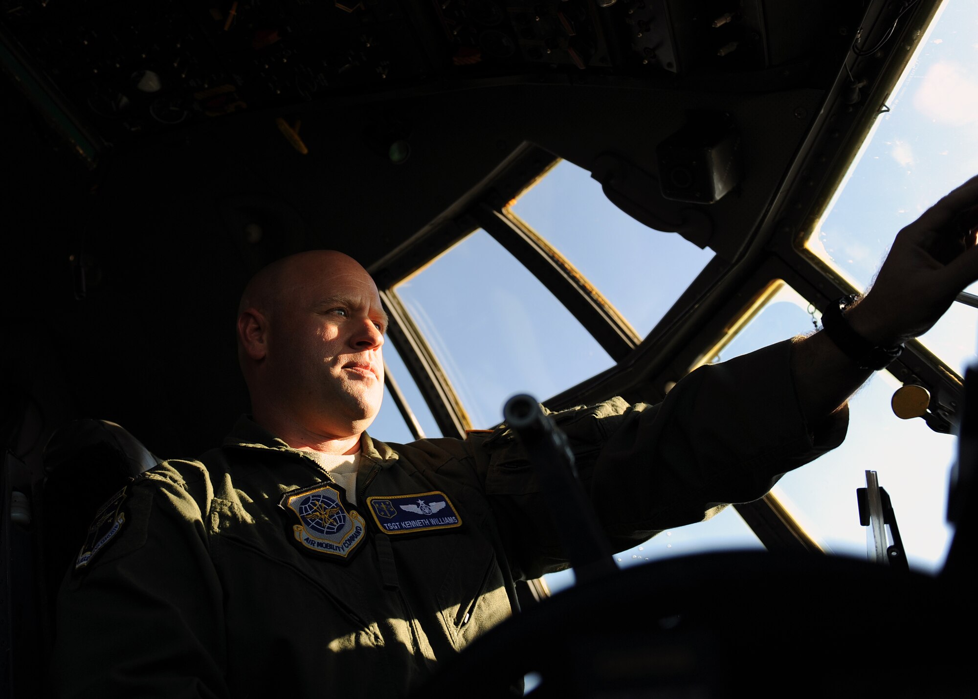 Tech Sgt. Kenneth Williams, a 19th Operations Group evaluator flight engineer, performs a systems check on a C-130J, Nov. 16, 2012 at Little Rock Air Force Base, Ark. Williams implemented new evaluation documentation procedures for his unit, decreasing critical errors  by 70 percent. Williams also mentored several Airmen in his unit on financial issues and budgeting, helping decrease their debt significantly. (U.S. Air Force photo by Staff Sgt. Jessica Condit)