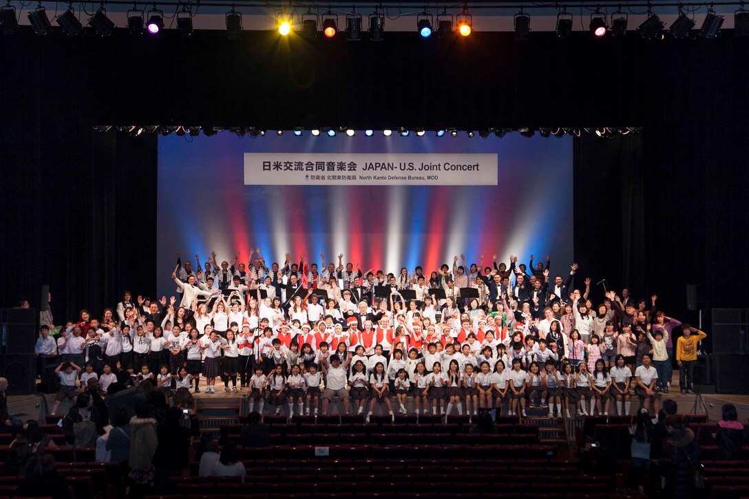 MUSASHIMURAYAMA, Japan -- Band of the Pacific-Asia bandsmen pose with other performing ensembles at the Japan-US Joint Concert at Musashimurayama Public Hall, Musashimurayama City, Japan on Dec. 2, 2012.  (Courtesy photo by “Photo Linkage” company.)