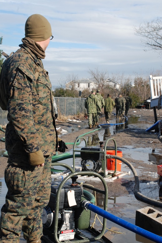 Service members, supporting the Army Corps FEMA mission to allow access to flooded homes in Breezy Point, NY, pumped an average of 750,000 to 1 million gallons of water a day in the week following Hurricane Sandy. The team, under the direction of the U.S. Army's 19th Engineer Battalion, consisted of more than 600 service members from the U.S. Army, Navy, Air Force and Marines. It worked in coordination with the local emergency responders and officials to allow access and speed recovery efforts in New York.