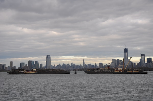 New York District drift collection vessels work long hours to clear tons of drift and debris from the New York and New Jersey Harbor after Hurricane Sandy. 