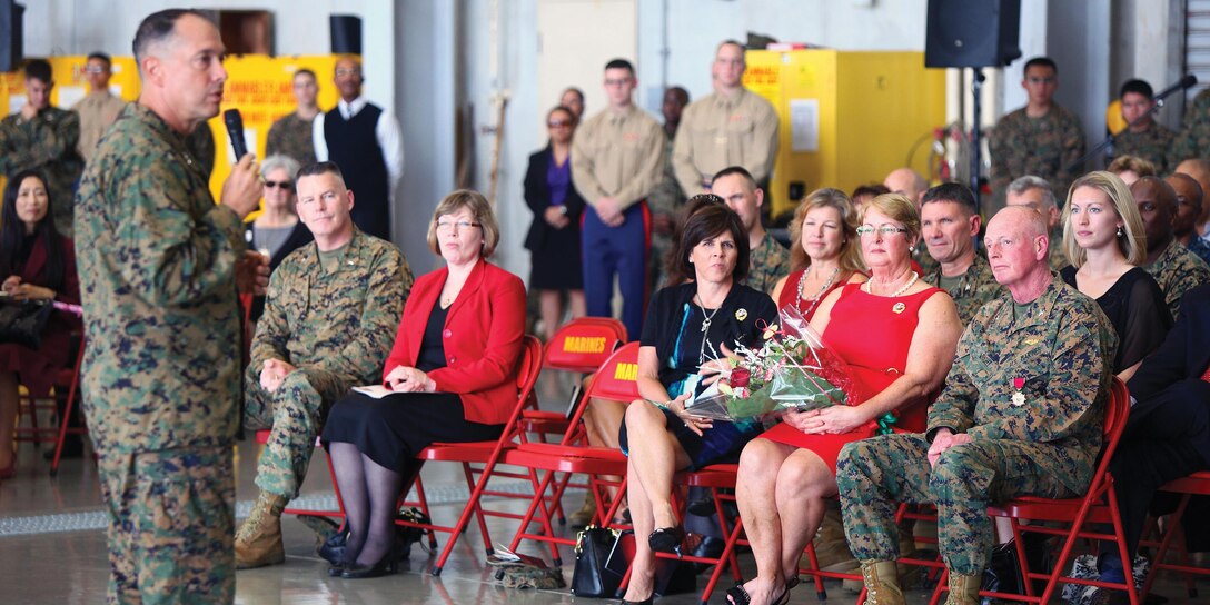 Maj. Gen. Peter J. Talleri, left, thanks Col. John C. Wright for his 40 years of service during Wright’s retirement ceremony at Marine Corps Air Station Futenma Nov. 29. Talleri is the commanding general of Marine Corps Installations Pacific and Marine Corps Base Camp Butler. Wright is the chief of staff of MCIPAC. 