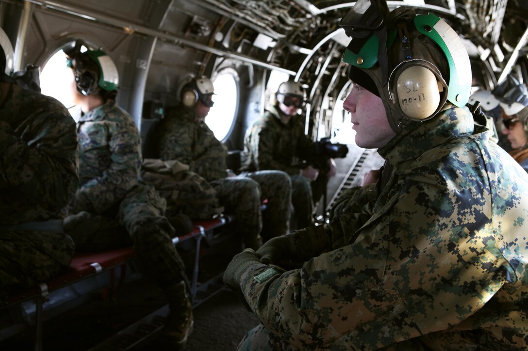 Marines with Marine Medium Helicopter Squadron (HMM) 764 fly to the Havasupai tribe on the Grand Canyon floor Dec. 4, 2012. The Marines helped load gear and volunteers with Flagstaff Marine League Charities and Flagstaff Toys for Tots organization on the CH-46E Sea Knight helicopters in order to bring holiday spirit to the most isolated tribe in America. (U.S. Marine Corps photo by Cpl. Jessica Ito/Released)