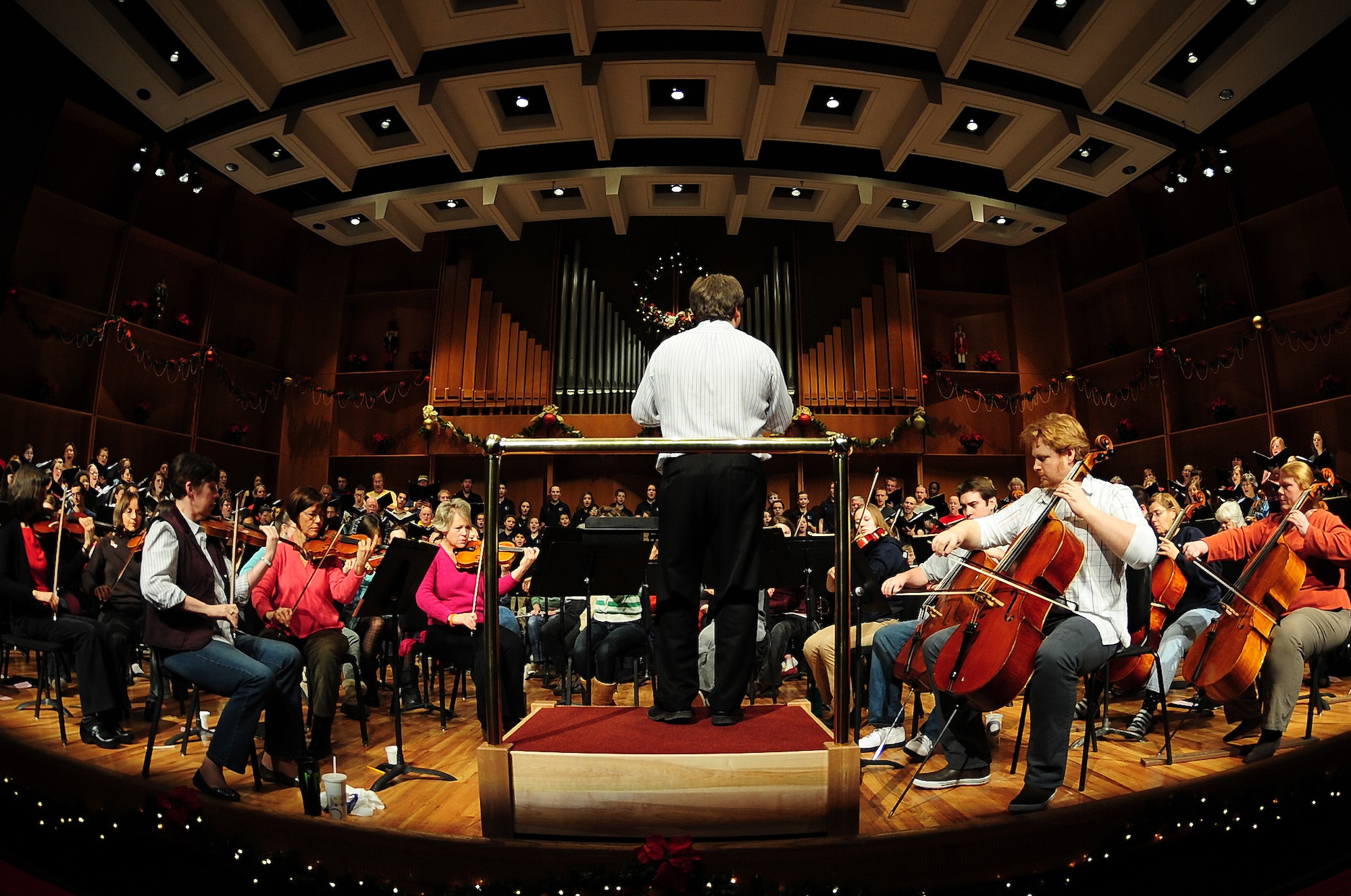 The Fairbanks Symphony Orchestra-Chorus rehearses for its annual holiday concert Dec. 1, 2012, Davis Concert Hall, Fairbanks, Alaska. The symphony performed multiple traditional holiday songs including Jingle Bells and Hallelujah. (U.S. Air Force photo/Airman 1st Class Zachary Perras)