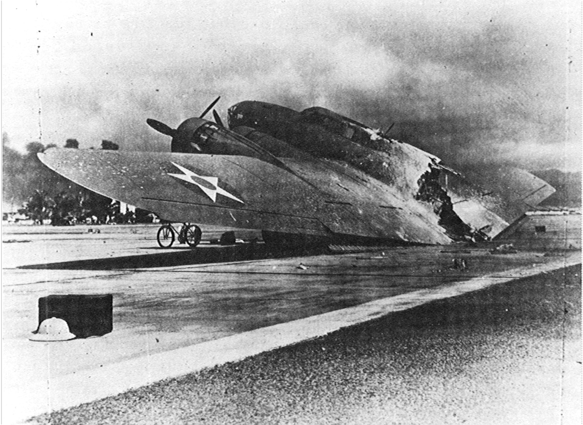 A burned U.S. B -17C after the Empire of Japan attacked Wheeler Air Field Dec. 7, 1941. The attack well known for crippling the U.S. Pacific Naval Fleet also left approximately 700 U.S Airmen killed or wounded and 66 percent of the Air Force strength in Hawaii decimated. The Japanese lost only 29 pilots from more than 350 planes launched from aircraft carriers north of Hawaii. (Courtesy Photo/Tai Sing Loo, Pearl Harbor's main cameraman 1918 to 1948)
