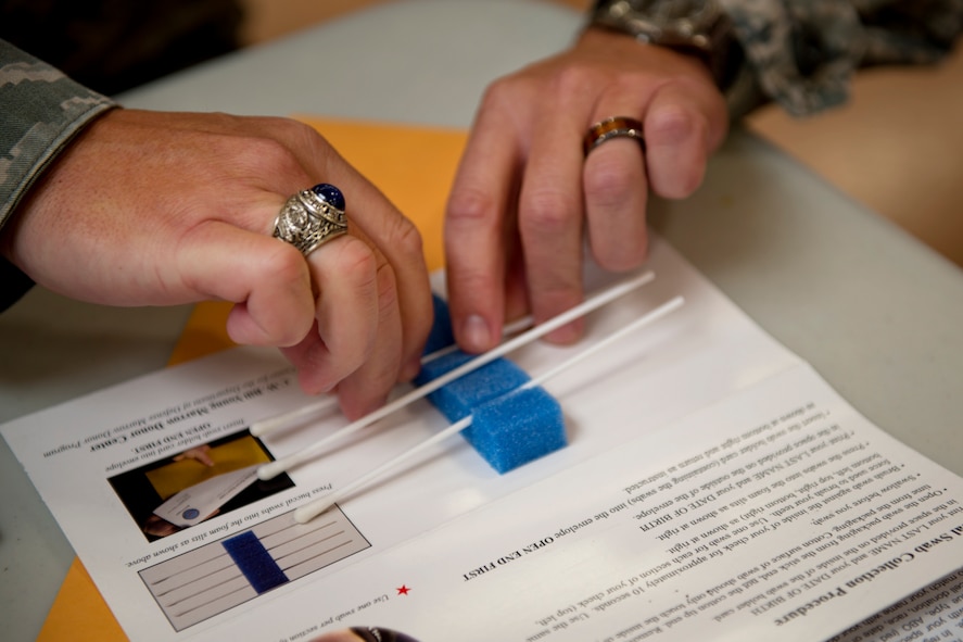 Col. Dann Carlson, 647th Air Base Group commander and Joint Base Pearl Harbor-Hickam vice commander, places the cotton swabs in the envelope for mailing his registration to the C.W. Bill Young Department of Defense Bone Marrow Donor Program, Nov. 29, 2012, at the Hickam Field Base Exchange. Since the creation of the National Marrow Donor Program in 1986, more than six million Americans, including more than 400,000 service members, have registered as marrow donors. According to the website, there is a particularly urgent need for minority donors, but anyone in good health between the ages of 18 and 60 is welcomed. As of April 30, 2012, there were 9,997,044 registered donors in the National database. To learn more, visit the website at www.dodmarrow.org. (U.S. Air Force photo/Staff Sgt. Mike Meares)