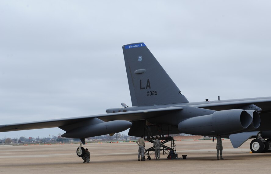 Maintainers work on a B-52H Stratofortress on Barksdale Air Force Base, La., Dec. 5. Airmen from multiple maintenance shops ensure the B-52 stays mission ready at all times. Some of the maintenance shops that contribute to the Barksdale mission include hydraulics, fuels systems, fabrications and egress. (U.S. Air Force photo/Airman 1st Class Benjamin Gonsier)

