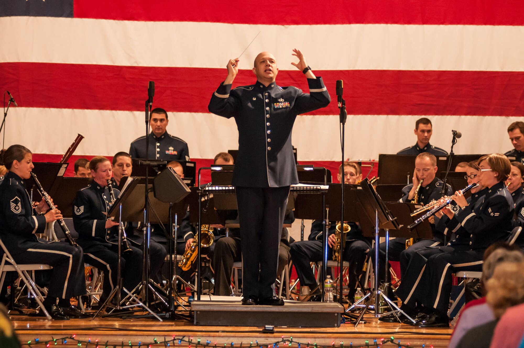 FRAMINGHAM, Mass. – Capt. Dave Alpar, U.S. Air Force Band of Liberty commander and conductor, leads the band during a holiday concert at Upper Nevins Hall Dec. 1. Each year, the band does a circuit of concerts around the region, spreading holiday cheer as well as the Air Force mission. (U.S. Air Force photo by Rick Berry) 