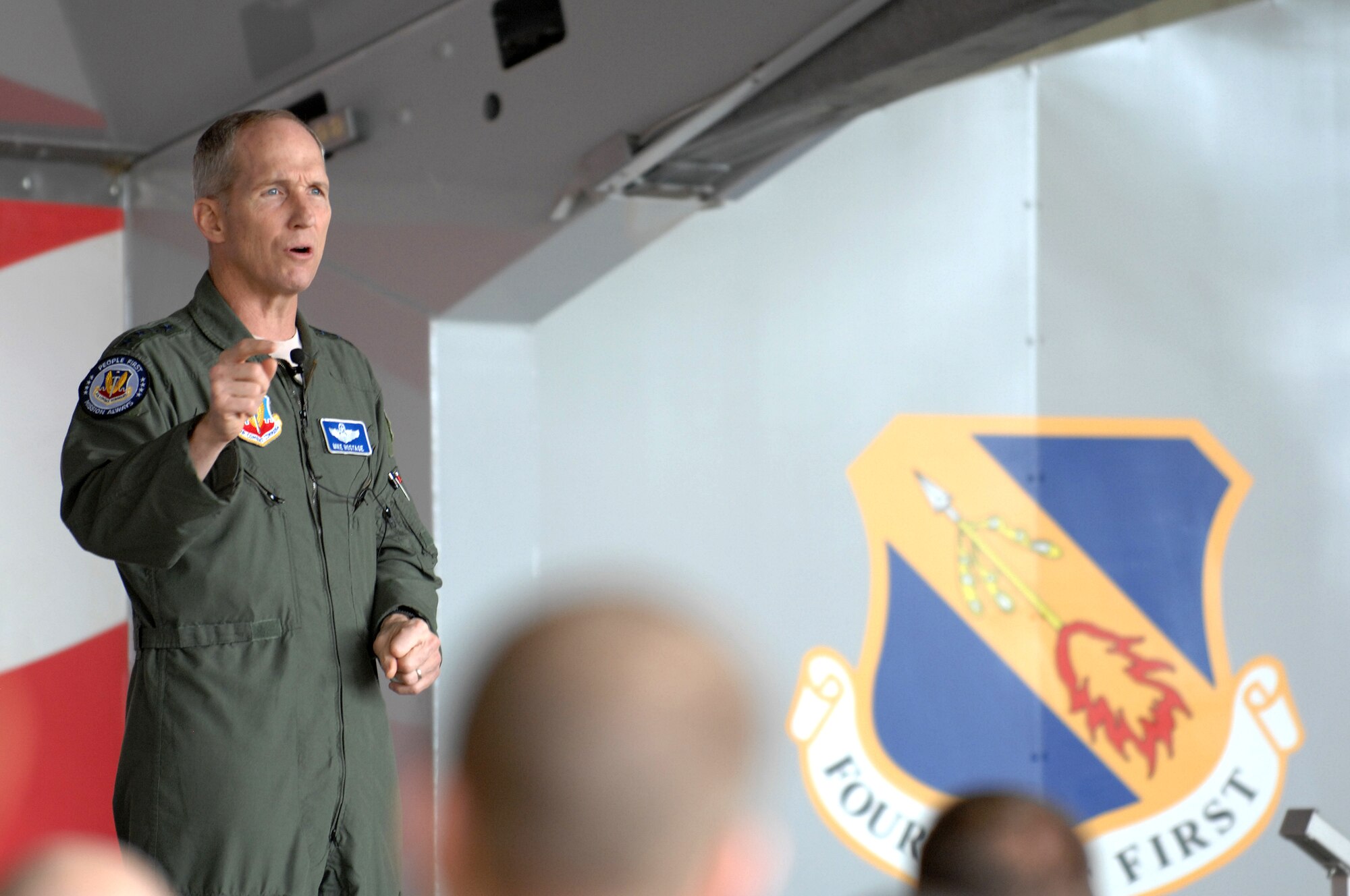 U.S. Air Force Gen. Mike Hostage, Commander, Air Combat Command, speaks to members of the 4th Fighter Wing during a visit to Seymour Johnson Air Force Base, N.C., Dec. 4, 2012. More than 500 members of Team Seymour came out to hear Hostage speak about topics relevant to the future of several Air Force programs. (U.S. Air Force photo/Airman 1st Class Aubrey White/Released)