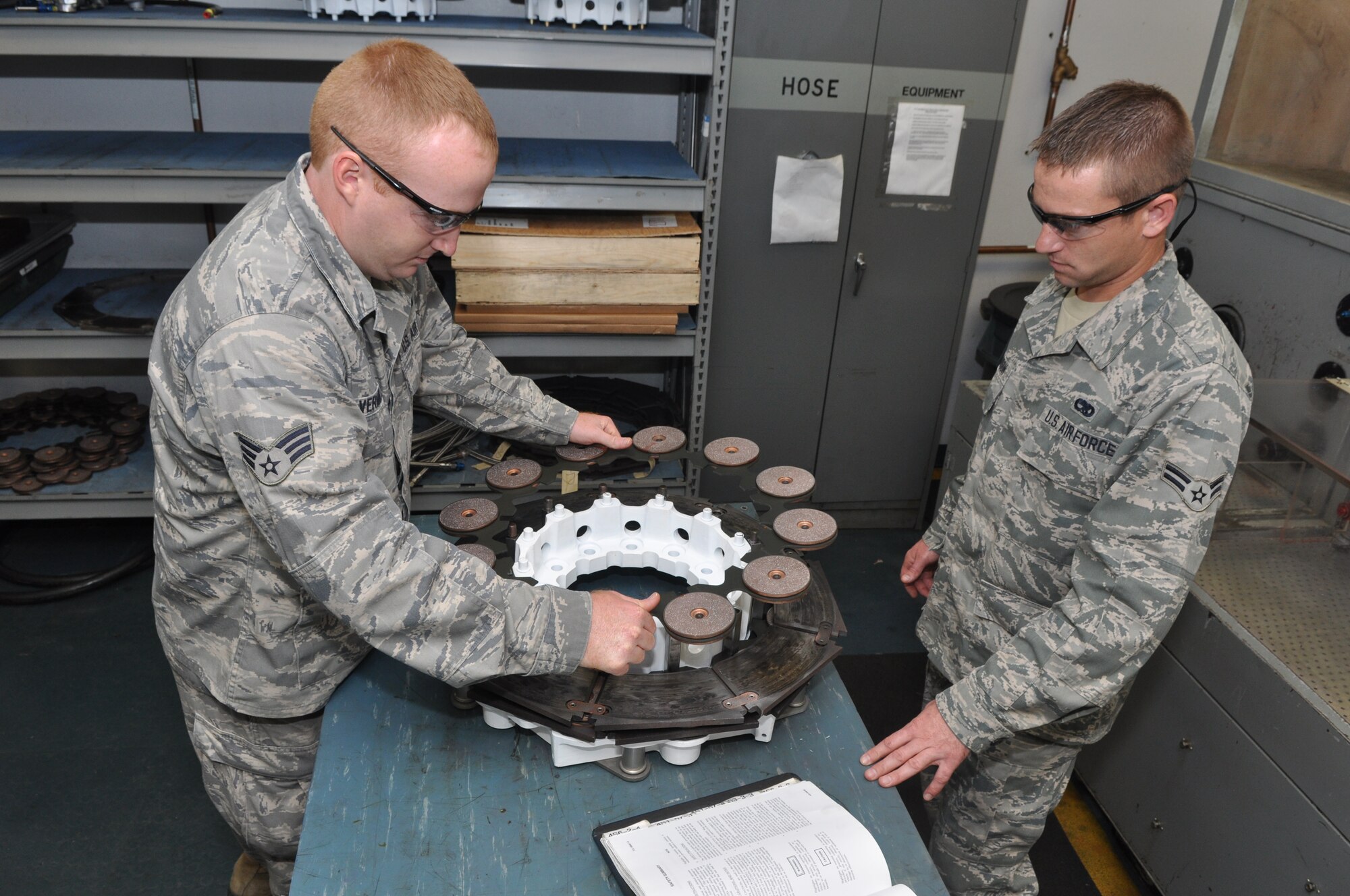 Tech. Sgt. Jimmy Beasley and Airman 1st Class Daniel Donaldson build a brake for a B-52 Stratofortress during the November Unit Training Assembly (UTA) at Barksdale Air Force Base, La., Nov. 4, 2012. Both Airmen are hydraulic technicians assigned to the 307th Maintenance Squadron. (U.S. Air Force photo by Master Sgt. Jeff Walston/Released) 