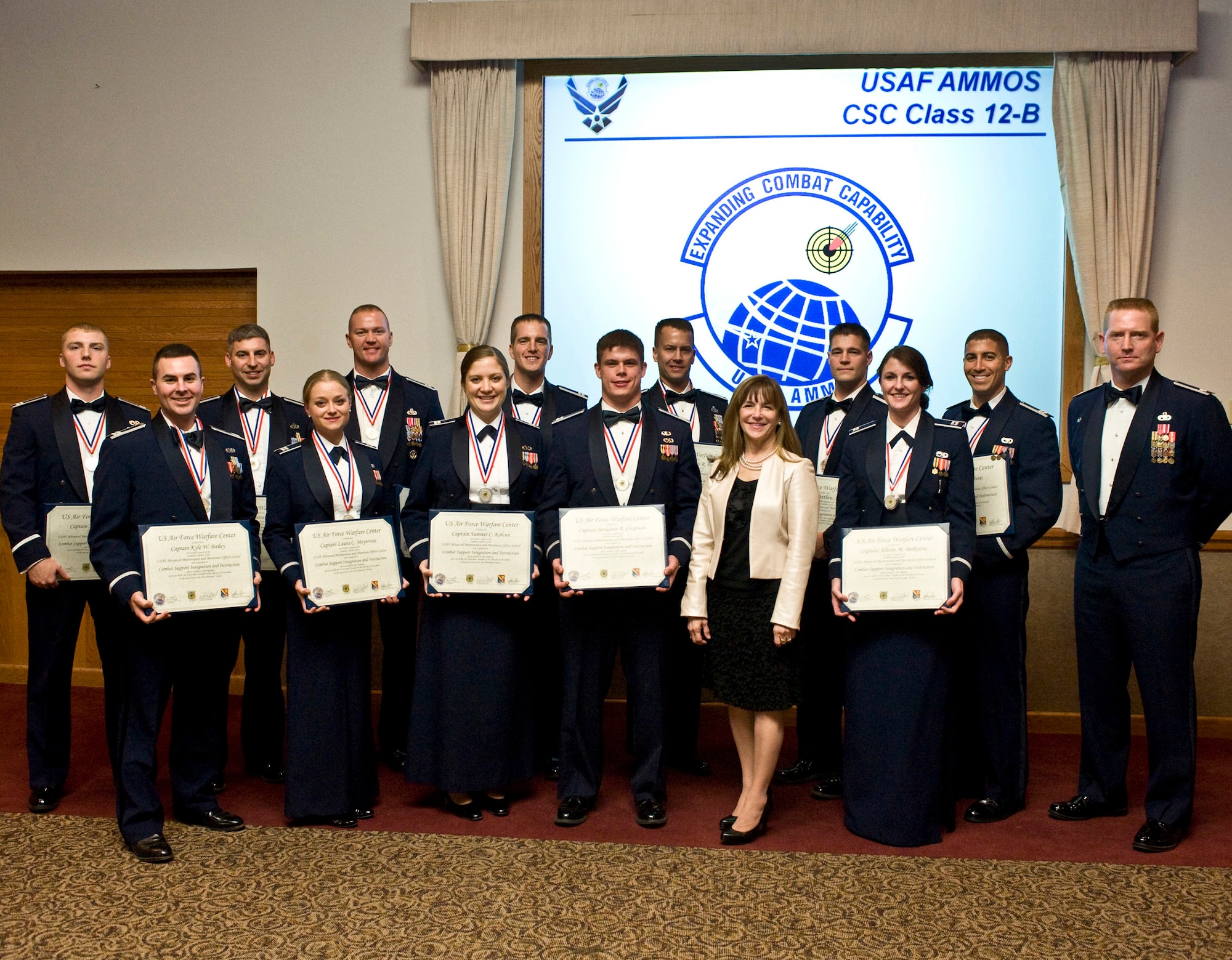 Graduating from the USAF Advanced Maintenance and Munitions Officers School Combat Support Course, Class 12B were Capt. Kyle Bailey, Cannon AFB, N.M.; Capt. Allison Barkalow, Whiteman AFB, Mo.; Capt. Benjamin Chapman, Joint Base Lewis-McChord, Wa.; Capt. Summer Kolcun, Joint Base Lewis-McChord, Wa.; Capt. David Liberti, Moody AFB, Ga.; Capt. Matthew Lyon, Creech AFB, Nev.; Capt. Laura Meyerrose, Nellis AFB, Nev.; Capt. Wilburn Poe, Jr., Whiteman AFB, Mo.; Capt. Christopher  Ryan, Joint Base Andrews, Md.; Capt. Kevin Scholz, Hq AF A4, Pentagon, Wash. D.C.; Capt. Thane Sisson, Hq AF A4L, Pentagon, Wash. D.C.; Capt. Joshua A. Walton, Mountain Home AFB, Idaho. (Courtesy Air Force Photo)