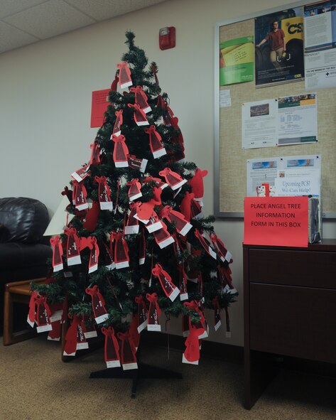 A tree decorated with angel ornaments sits in the Airman and Family Readiness Center for the annual Angel Tree Project at Moody Air Force Base, Ga., De. 3, 2012. The Angel Tree Project is a program that supports Air Force families in need of financial assistance by purchasing gifts for their children during the holiday season. (U.S. Air Force photo by Airman 1st Class Olivia Bumpers/Released) 