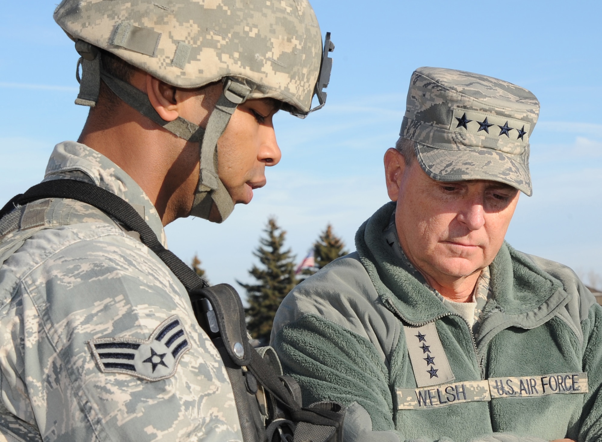 Air Force Chief of Staff Gen. Mark A. Welsh III talks with Senior Airman Michael Walker, 91st Security Forces Operations Squadron, during a tour of the U-01 launch facility trainer here, Nov. 21. The tour was part of Welsh’s first visit to Minot since becoming the chief of staff. (U.S. Air Force photo/Airman 1st Class Andrew Crawford) 

